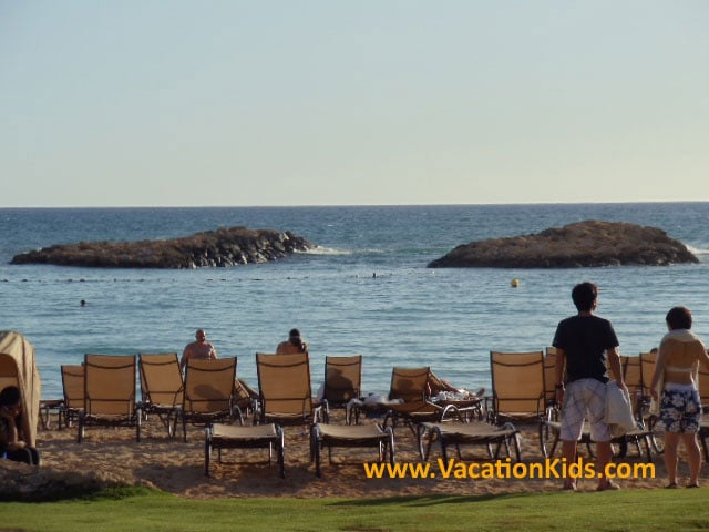 The beach at Disney Aulani is a protected lagoon perfect for little swimmers with gentle wave protected from the open ocean.