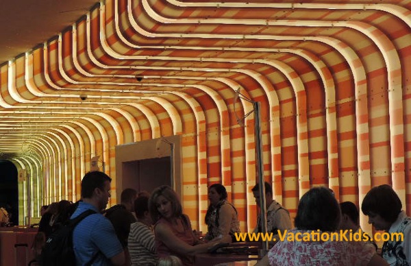 Families are welcomed and check in under a canopy of color at Disney's Art of Animation Resort