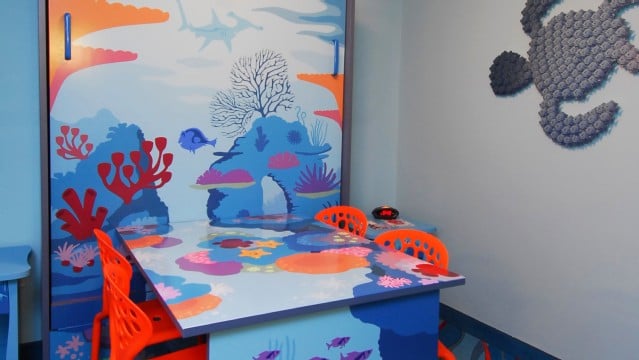 By Daytime This colorful dining room table is the perfect spot for a quick bite or a family board game