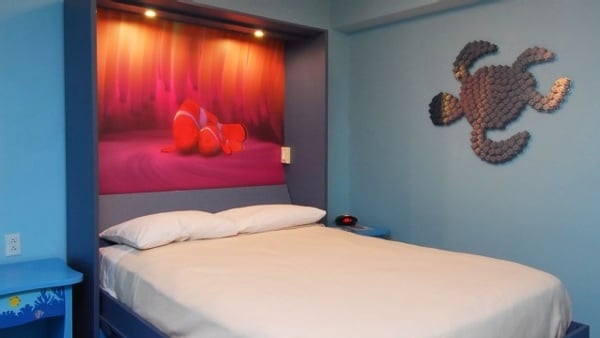 At Night, the dining room table quickly converts into a comfortable double bed that sleeps two