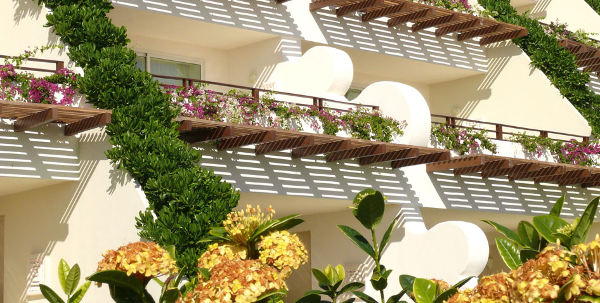 Shade and Bougenvilla vines decorate your family's terrace at the Grand Velas Riviera Maya