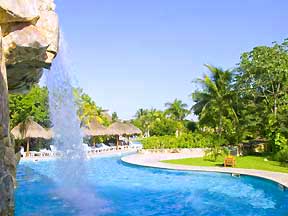 The Iberostar Paraiso Beach resort offers an enormous pool with islands and waterfalls