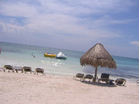 Dreams Tulum Beach offers climbing iceburgs for the kids and shady palapas where parents can relax