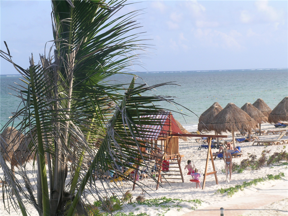There is a beach playground for kids at the Ocean Coral & Turquesa Resort