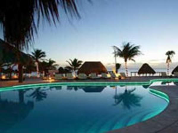 Night view of Azul Beach Resort pool