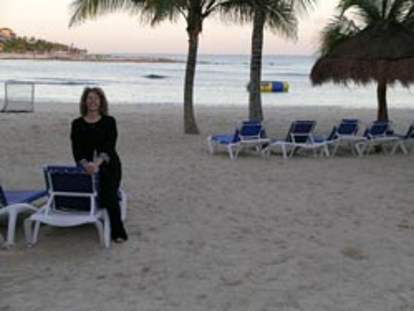 Sally Black, founder of Vacationkids on the beach at Dreams Puerto Aventuras Resort in the Riviera Maya Mexico