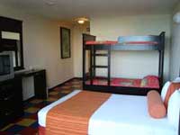 Downstairs view of the family suite at the Crown Paradise Hotel in Cancun that will sleep up to 7 family members