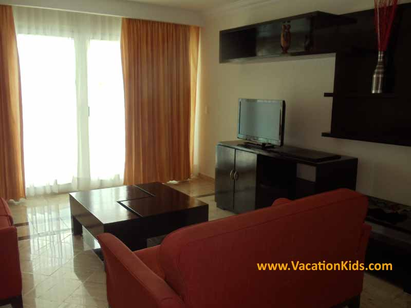Living room area of family suites at the Krystal Hotel Cancun