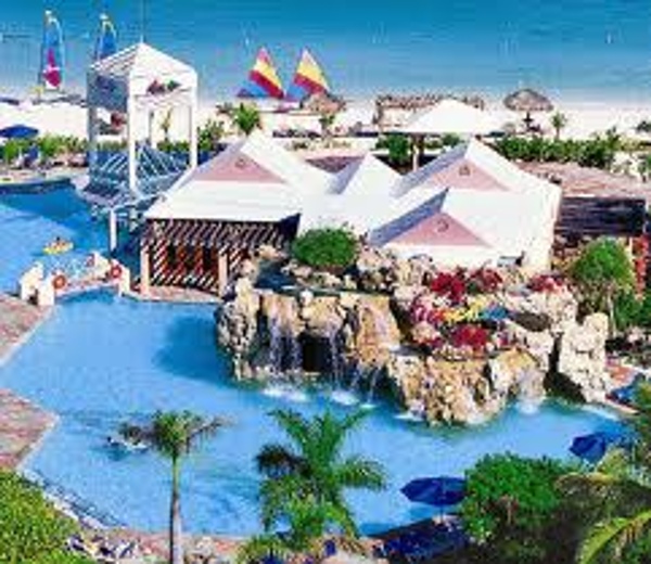 View of the main pool and waterfalls at the Caribbean village of Beaches Turks & Caicos
