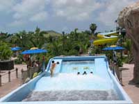 Beaches Turks & Caicos Flowrider surfing simulator at the Pirates Waterpark here.