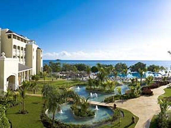 Iberostar Rose Hall Beach Resort in Jamaica offers a huge infinity pool that stretches right to the Caribbean Sea