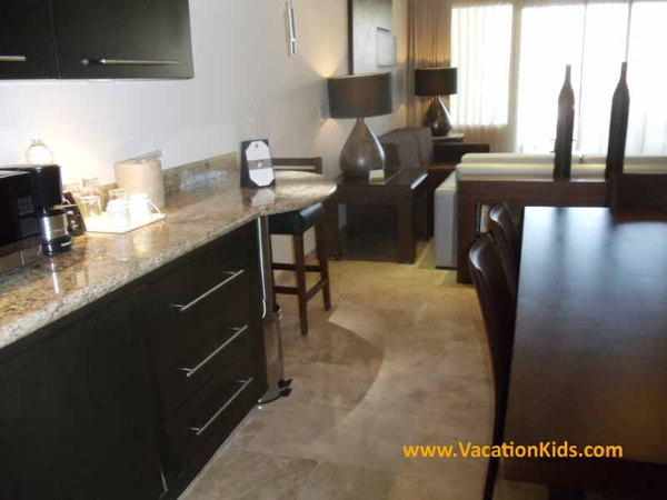 Living room of the 1 bedroom family concierge suite at the Paradisus La Esmeralda Resort