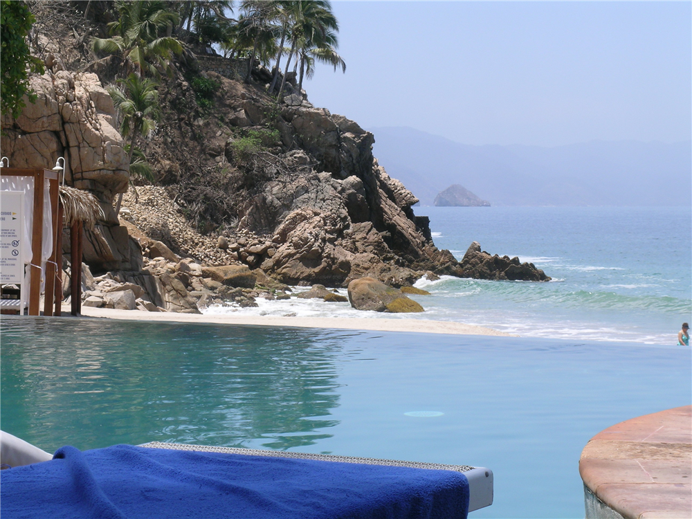 Pool view from my lounge chair at Dreams Puerto Vallarta. Where's my pina colada?