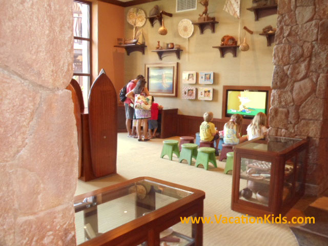 At Disney Aulani, while parents check in Kids have their own area just across the lobby full of interactive activities that will keep their attention while grown ups take care of business.