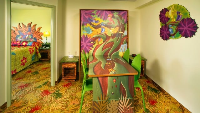 Art Of Animation Lion King family suite offers a dining room table that will seat 6 by day and sleep two by night