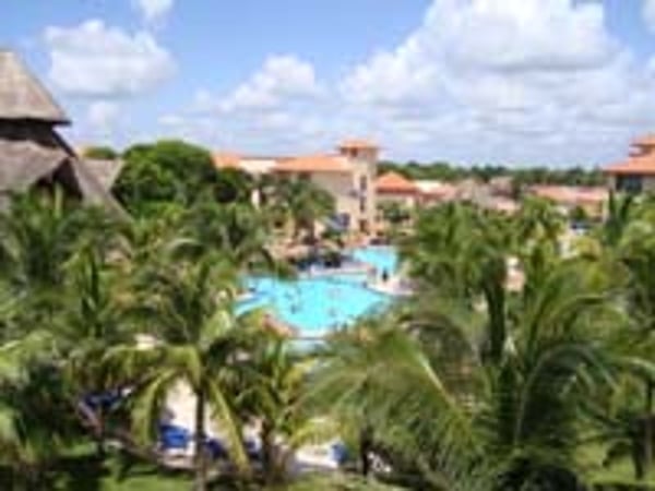 Sandos Playacar Beach Resort & Spa offers lush surroundings for the perfect all inclusive family vacation