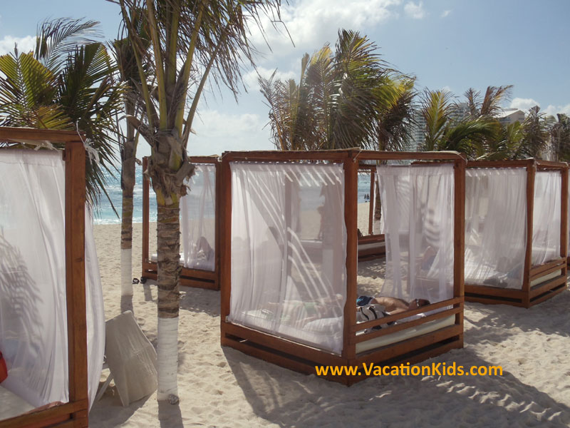 Beach beds at the Krystal Hotel Cancun are waiting for you and your family