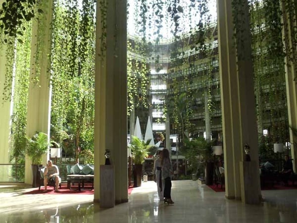 The 9 story hanging gardens in the atrium of the Paradisus Cancun is a beautiful spot for a family destination wedding.
