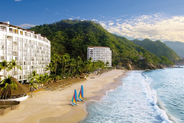 View of the beach and 2 tower buildings at Dreams Puerto Vallarta
